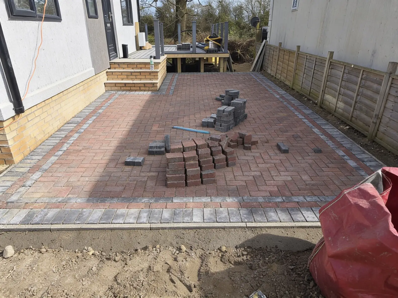 Brindle block paving driveway with a charcoal soldier-course border