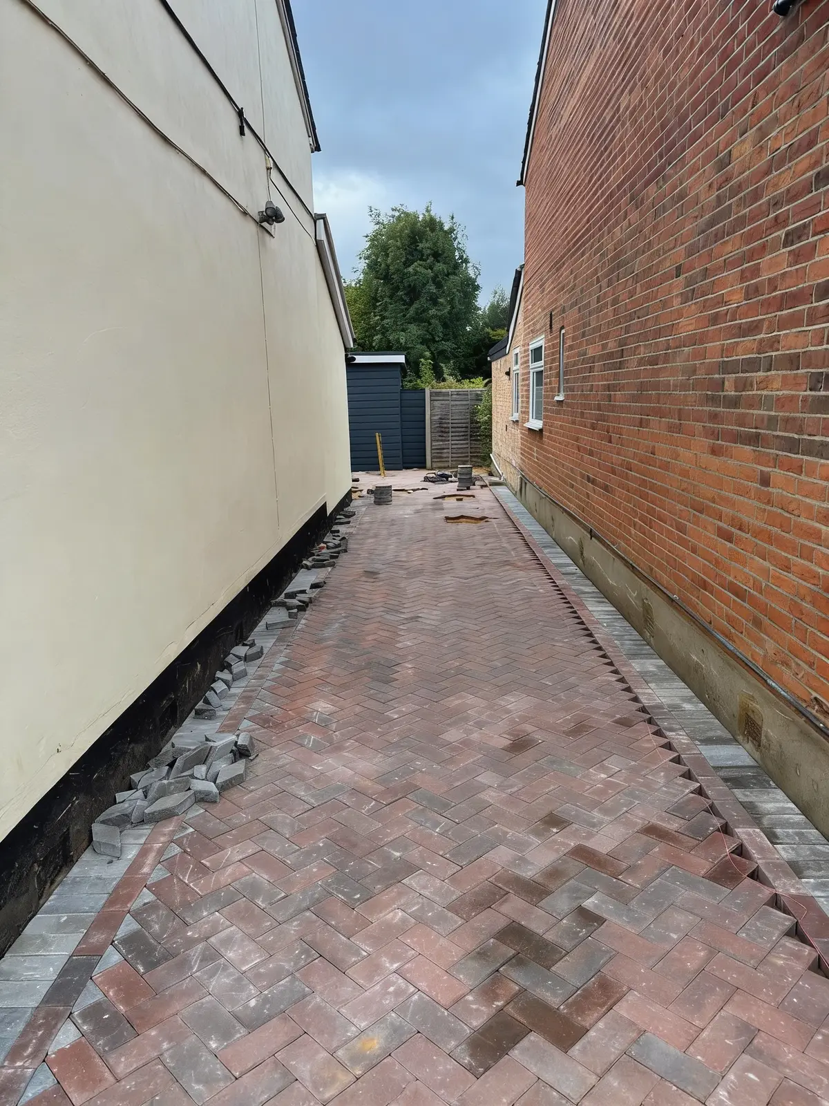 Finished brindle herringbone path down the side return