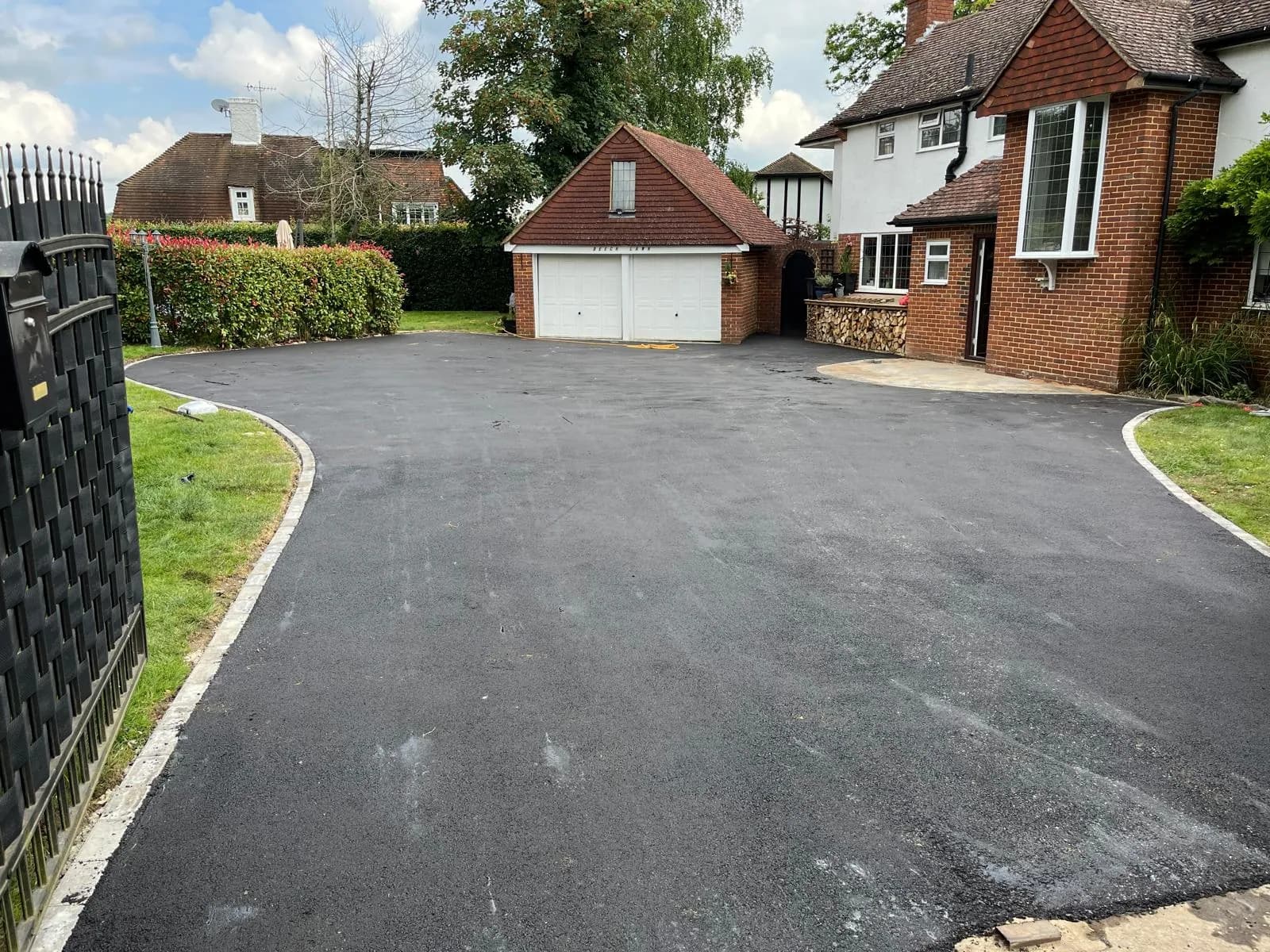 Finished smooth tarmac driveway